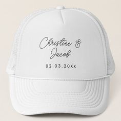 a white trucker hat with the words family reunion printed on it, in black ink