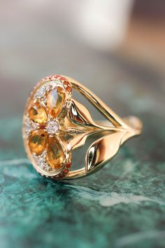 Orange slice ring with citrine, diamonds and sapphires | Eden Garden Jewelry™ Gold Fruit, Statement Engagement Ring, Faberge Jewelry, Nature Inspired Engagement Ring, Orange Slice, Orange Fruit, Custom Ring Designs, Deco Engagement Ring, Clothes Outfits