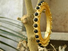 You will receive very beautiful 1 pcs Gold plated brass bangle Flower Stone bangle, Lapis Pearl black onyx & turquoise bangle, Gold plated gemstone bangle bracelet . Metal: Brass Bangle Size: 90 mm Inner diameter:59 mm Many thanks for you visit my store ♥ if you have any question please contact us. For wholesale Price Please Convo me. You can order different items as many you like . Handmade Black Temple Jewelry, Traditional Black Bracelets For Weddings, Traditional Black Bracelet For Wedding, Traditional Black Wedding Bracelets, Black Bangle Bracelets For Festive Occasions, Festive Black Bangle Bracelets, Traditional Black Bangle Jewelry, Festive Black Bangle Bracelet, Traditional Black Bangle Gift