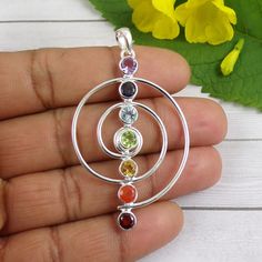 Amethyst, Iolite, Blue Topaz, Citrine, Peridot, Carnelian, Garnet Pendant, 925 Silver Pendant, Mothers Gift, Huge Shape Pendant, N010316 Metal - Solid 925 Sterling Silver Gemstone - Amethyst, Iolite, Blue Topaz, Citrine, Carnelian, Peridot Stone Size- 5mm Main Color: Multi  Weight: 8.5gram  You can use it your self or Gift it to someone. It is an ideal gift which everyone would love to get. If you want extra small or extra large let me know. We will make it specially for you. Brought to you excl Spiritual Multi-stone Oval Gemstones, Round Rainbow Stones Jewelry, Spiritual Round Birthstone Gemstones, Rainbow Round Stone Jewelry, Multicolor Round Fusion Gemstones, Rainbow Colored Round Stone Jewelry, Spiritual Birthstone Gemstones, Fusion Style Multicolor Round Gemstones, Multicolor Round Sterling Silver Gemstones