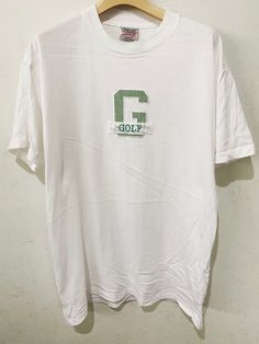 "Brand: Golf Size: M Made In USA Measurements are taken with the garment laying flat. Chest width: 19.5\" Body Length : 27.5\" Condition: Pre-owned 8.5/10 Material: 60/40% Cotton Comment Good Condition No refund. -Payment : accept paypal only -Shipping : to shipping worldwide by registered airmail (small package) Thai post registered. receiving the item within 7-30 business days non sat-sunday working after payment cleared (some case in Australia/italy/spain/north and south america 2-4 weeks) I Golf Embroidery, Dare Shirt, Frankie Goes To Hollywood, Embroidery Shirt, Vintage Golf, Nfl Shirts, North And South, North And South America, Shirt Embroidery