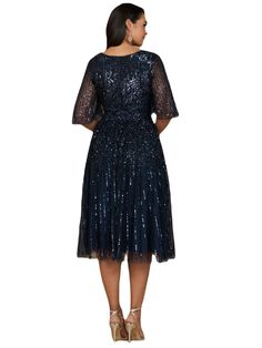 Beaded v-neckline midi dress. This dress features a long flowing A-line silhouette giving an elegant sequined Midi look. It is a great dress for a fun and easy night out, or a wedding guest! It's great for someone looking for a modest and fun look Back zipper Beaded tulle on stretch jersey lining Professionally clean Imported Short sleeves Midi dress Fits true to size, we recommend ordering your normal size. Fitted body with flowing skirt Glamorous Embellished V-neck Midi Dress, Elegant A-line Sequin Dress For Evening, Knee-length Sequin Formal Dress, Formal Knee-length Sequin Dress, Midi Length Gala Dress With Contrast Sequin, Knee-length Sequin Midi Dress For Formal Occasions, Midi Length Dress With Contrast Sequin For Gala, Contrast Sequin Midi Dress For Gala, Sequin A-line Evening Dress