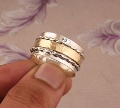 Made by   SHREEJAIPURSILVER925  Designed By  https://shreejaipursilver925.etsy.com#holidaytable #cyberweek  band width  : 11 to 13 MM Metal: 925 Sterling Silver & Brass Ring Size: Optional Quantity: 1 Piece Spinner Ring:- click more spinner rings:- https://www.etsy.com/in-en/shop/Shreejaipursilver925?ref=seller-platform-mcnav&search_query=spinner+rings ''Spring Trends'' THIS ALL DESIGN IS CRATED BY SHREE JAIPUR SILVER ITS ORIGNAL DESIGN NO OTHER SITE IS SELLING THIshreejaipursilver925 Worry Ring, Silver Spinner Rings, Spinner Rings, Thumb Rings, Spring Trends, Jaipur, Solid 925 Sterling Silver, Band Rings, Gifts For Women