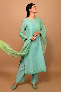 Sea green silk kurta with placed embroidered floral applique motifs. Comes with matching pant and floral print dupatta. - Aza Fashions Green Silk Kurta With Embroidered Border, Green Silk Set With Floral Embroidery, Spring Embroidered Tissue Silk Kurta, Pista Green Silk Kurta For Spring, Spring Silk Sets With Embroidered Border, Spring Silk Kurta With Embroidered Neckline, Festive Green Kurta With Embroidered Neckline, Green Sets With Embroidered Neckline, Elegant Green Kurta With Embroidered Sleeves