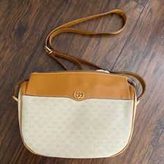 Gucci Authentic Vintage Monogram Crossbody Handbag With Adjustable Leather Strap. Good Used Condition , Has Wear, Seen In Pics. Edge And Corner Wear, Some Thread Has Come Un-Sewn As Seen Pic. The Inside Has Peeled Off. Still Has Lots Of Life Left, Great Size, Fits All Your Essentials. Tags; Vintage , Festival, And 80's, 70's, Neutrals, Casual, Trendy, Boho Gucci Leather Pouch Bag, Gucci Crossbody Shoulder Bag With Removable Pouch, Gucci Shoulder Satchel, Brown Gucci Bag With Adjustable Strap, Gucci Crossbody Satchel With Detachable Strap, Gucci Brown Bag With Adjustable Strap, Gucci Leather Bag With Removable Pouch, Gucci Shoulder Bag With Removable Pouch, Gucci Tote Shoulder Bag With Removable Pouch