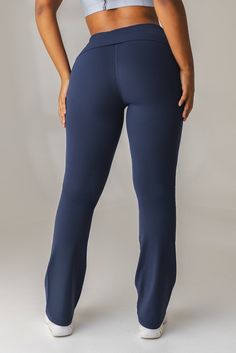 Our Cloud II Foldover Trouser is designed for the ultimate comfort whether you are enjoying your workout of the day or stopping by your favorite coffee shop. This pant offers medium support and compression to accentuate your assets. Navy Families, Workout Of The Day, Squat Proof, Athletic Apparel, Workout Shorts, Coffee Shop, The Day, Sapphire, Trousers