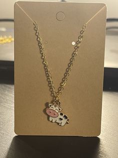 "Happy Cow Necklace.  Gold Finish 18\" Cable Chain in Multiple Colors Available Colors: -  Black - White" Cow Necklace, Cow Stuff, Casual Country Outfits, Happy Cow, Cow Gifts, Book Flowers, Craft Tote Bag, Charm Necklaces, Cute Cows