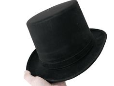 PRICES MAY VARY. Polyester Imported Pull On closure Hand Wash Only Victorian black top hat. This Victorian top hat features high-quality felt and a black ribbon Hatband with a bow on the side for a sophisticated look. This Victorian hat is made with 100% polyester material. Measuring 10 3/4in wide x 11 3/4in long x 7in tall, this black top hat will last you party after party. This costume hat is a perfect accessory to complete your party costume. Wear it to your Halloween party, themed parties, Black Brimmed Top Hat For Cosplay, Black Top Hat With Short Brim For Cosplay, Tiny Top Hat, Victorian Top, Hat Cosplay, Victorian Hats, Black Top Hat, Steampunk Cosplay, Dressup Party