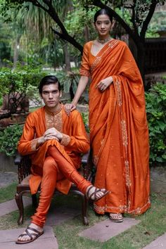 Shop for Deepthee Orange Silk Yoke Embroidered Kurta And Churidar Set for Men Online at Aza Fashions Designer Orange Kurta With Chikankari Embroidery, Orange Chikankari Embroidered Traditional Wear For Festive Occasion, Orange Chikankari Traditional Wear For Festive Occasions, Festive Orange Kurta With Resham Embroidery, Orange Saree With Resham Embroidery For Eid, Orange Resham Embroidery Saree For Eid, Eid Orange Saree With Resham Embroidery, Orange Raw Silk Traditional Wear With Zari Work, Orange Raw Silk Kurta For Eid