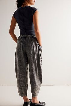 The definition of effortless, these pull-on pants will be your go-to from this season to the next. **Fit:** Mid-rise, tapered barrel silhouette **Features:** Pull-on design, dropped pouch pockets, washed dye fabrication, ankle-length inseam **Why We ❤ It:** Beachy with simple sandals or toughened-up with moto boots, this pair has endless ways to wear. | High Road Pull-On Barrel Pants by Free People in Green, Size: S Barrel Pants, Funky Clothes, Dried Basil, Simple Sandals, High Road, Top Graphic Tees, Bottom Clothes, Moto Boots, Pull On Pants