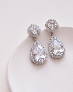 CZ Bridal Earrings Rhinestone Wedding Earrings Silver Bridal | Etsy Diamond Teardrop Earrings For Wedding, Diamond Drop Crystal Earrings For Wedding, Diamond White Sparkling Bridal Earrings For Wedding, Diamond White Sparkling Stones Bridal Earrings For Wedding, Diamond White Bridal Earrings With Sparkling Stones For Wedding, White Teardrop Diamond Earrings For Wedding, White Teardrop Wedding Earrings With Diamond Accents, Diamond Teardrop Earrings With Sparkling Stones For Wedding, White Diamond Accents Teardrop Earrings For Wedding