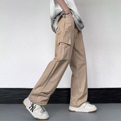 Our Casual Literary Straight Cargo Pants are an essential piece for any stylish look. Boasting a sophisticated solid color and deep pocket detail, these premium pants are the perfect balance of casual and literary. Ideal for any occasion, you'll feel both comfortable and confident in these urban-chic trousers. Features: -100% Cotton -Mid-rise waist -Solid Color -Straight Leg -Regular Fit -Casual style Urban Wide-leg Pants With Pockets, Solid Wide Leg Pants With Pockets For Streetwear, Wide Leg Cargo Jeans With Patch Pockets, Solid Wide Leg Cargo Pants With Patch Pockets, Solid Straight Leg Cargo Pants For Streetwear, Solid Color Relaxed Fit Cargo Pants, Relaxed Fit Solid Cargo Pants, Solid Color Baggy Trousers Work Pants, Casual Solid Cargo Pants With Cargo Pockets