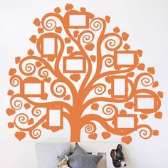 an orange tree wall decal with hearts and frames in the shape of a heart