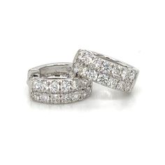 Treat yourself to our two row pave diamond huggie earrings and add some sparkle to your dazzling look. Crafted with 0.71ct t.w. genuine diamonds, these earrings are certain to make a statement! Make your style unforgettable with this beautiful, timeless piece of jewelry. Metal: 18K White GoldDiamond Shape: Round Brilliant CutsDiamond Weight: (28) Diamonds 0.71ct t.w.Width: 5mm x 13mm Estimated production time is 4 - 5 weeks. White Diamond Huggie Earrings With Pave Setting, White Diamond Huggie Earrings With Accents, White Brilliant Cut Cubic Zirconia Huggie Earrings, White Huggie Earrings With Pave Setting For Anniversary, Diamond Huggie Earrings With Pave Setting For Anniversary, White Pave Setting Huggie Earrings, Wedding Huggie Earrings With Diamond Pave Setting, Wedding Huggie Earrings With Pave Setting, White Huggie Earrings With Pave Setting