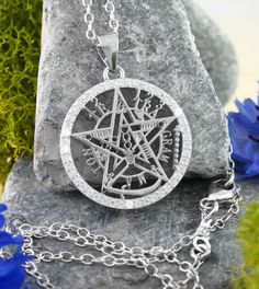 Material: 100% Sterling silver & cubic zirconia Weight: 2.4 grams More than 3/4 inch diameter (20mm) Item number: wh515 In the mid-1800's, French occultist Eliphas Levi developed this complex symbol to represent the totality of human existence. It combines two large concepts: The first is the Tetragrammaton. The root word 'tetragram' is Greek and means “consisting of four letters”. In this case, it's the four-letter Hebrew word for the unspeakable name of God. It contains the four Hebrew letters Moon Pentacle, Celtic Moon, Name Of God, Human Existence, Hebrew Letters, Celtic Tree Of Life, Nautilus Shell, Feather Ring, Celtic Tree