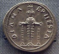 an ancient coin with the image of jesus on it