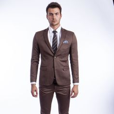 Elevate Your Style And Make A Statement With The Sean Alexander 2-Piece Suit Set, A Harmonious Blend Of Timeless Elegance And Contemporary Sophistication. Crafted With Meticulous Attention To Detail, The Suit Features A Sleek, Solid-Color Design, A Skinny Fit For A Tailored Silhouette, And A Host Of Convenient Features Like Underarm Sweat Guards, French Facing, And Ample Pockets In The Jacket. The Matching Pants Offer Comfort And Style With A Flat Front, Lined To The Knee, And Secure Fastening. Brown Slim Fit Sets For Semi-formal Occasions, Brown Slim Fit Business Sets, Brown Tailored Sets With Suit Collar, Slim Fit Sets With Suit Collar For Office Wear, Brown Slim Fit Notch Lapel Set, Formal Slim Fit Brown Sets, Brown Fitted Business Sets, Brown Slim Fit Sets For Workwear, Fitted Brown Suits For Office Wear