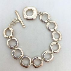 Beautiful Vintage Tiffany & Co. Cushion Link Toggle Bracelet. Excellent Condition. Fits Up To 7 1/2” Wrist. Comes In Original Tiffany Box. Elegant Adjustable Sterling Silver Bracelet With Solid Link, Chic Formal Jewelry With Toggle Clasp, Modern Sterling Silver Bracelet With Toggle Clasp, Elegant Formal Chain Bracelet, Elegant Metal Bracelets With Toggle Clasp, Formal Metal Bracelet With Toggle Clasp, Metal Bracelet With Toggle Clasp For Formal Occasions, Adjustable Formal Bracelets With Toggle Clasp, Formal Adjustable Bracelets