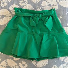 Nwt, Never Worn, Built In Shorts Spring Day Out Skort With Pockets, Trendy Skirt For Brunch, Chic Green Skirted Bottoms, Green Flowy Skirt For Spring, Spring Mini Length Belted Bottoms, Spring Season Belted Bottoms In Mini Length, Chic Pleated Skirt For Brunch, Chic Green Bottoms For Day Out, Belted Skirt For Spring