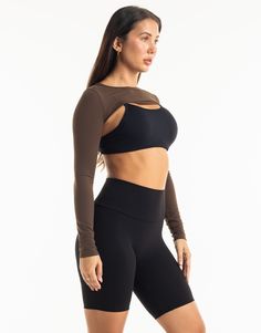 Functional athleisure at its finest. The Range Long Sleeve is the perfect garment to complete your workout look. Featuring a slim fit, super cropped length, the Range Long Sleeve is perfect to throw over your favorite ECHT sportsbra or with Range V3 Sportsbra as shown and matching Range Leggings! - Super Cropped Length - perfect with high-rise pants - Mix and match with your favourite ECHT sportsbra - Fabric: Super soft and breathable - Slim fit skims your body - Silver logo on sleeve - Breathability and ease of movement 81% Nylon, 19% Spandex Range V3 Sportsbra is sold separately. Stretch Crop Top For Pilates, Versatile Moisture-wicking Crop Top For Gym, Versatile Sports Crop Top With Medium Support, Versatile Breathable Sports Crop Top, Sporty Breathable Crop Top With Medium Support, Versatile Breathable Crop Top For Sports, Breathable Versatile Crop Top For Workout, Versatile Breathable Crop Top For Workout, Functional Crop Top For Workout