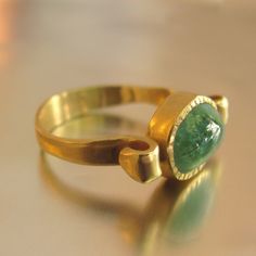 14k Solid Yellow Gold Ring With Green Emerald. Unique Oval Emerald Ring In Yellow Gold, Unique Yellow Gold Oval Emerald Ring, Unique 14k Gold Emerald Ring As Gift, Unique Oval Emerald Ring In 14k Gold, Heirloom Style Emerald Open Ring In Yellow Gold, Elegant Gold Emerald Ring With Polished Finish, Oval Emerald Ring In 14k Gold, Heirloom Emerald Open Ring In Yellow Gold, Heirloom Yellow Gold Emerald Open Ring