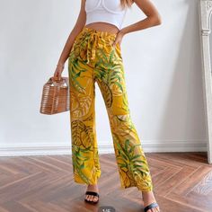 Yellow Wide Leg Pants With Green Leaves. Elastic Waist. Model Is 5'9 Size Xs (Fits Like A Small) These Are Too Large For Me, I'm A Size Xs. And I'm 5'2. Listing As A Small Since That's How They Fit. But They Are Labeled Xs. Brand New, Never Worn! Casual Yellow Pants, Yellow Wide-leg Pants For Spring, Casual Yellow Wide-leg Pants, Yellow Wide Leg Bottoms For Spring, High Waist Yellow Pants For Vacation, Yellow Pants With Elastic Waistband, Yellow Straight Pants With Elastic Waistband, Yellow Summer Pants With Pockets, Yellow Wide Leg Bottoms With Elastic Waistband