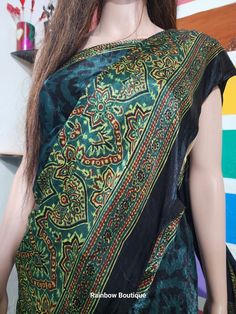 Please click the below link to see all ranges of Modal Silk Sarees. https://www.etsy.com/your/shops/me/tools/listings/section:48833136,order:ascending,stats:true This modal silk saree speaks a thousand words. No reason to leave this one behind. It is indeed difficult to find such a unique design. The modal silk saree fabric is buttery smooth and drapes well on the body. The shine and luster of the fabric is eye-catching and make you stand out in the crowd. This Saree creates a bold statement wit Festive Bohemian Pre-draped Saree With Printed Border, Multicolor Block Print Pre-draped Saree For Festivals, Traditional Multicolor Block Print Pre-draped Saree, Bohemian Multicolor Block Print Pre-draped Saree, Black Bohemian Blouse For Navratri, Bohemian Black Blouse For Navratri, Bohemian Batik Print Saree For Festive Occasions, Festive Bohemian Saree With Batik Print, Bollywood Style Batik Print Saree For Diwali