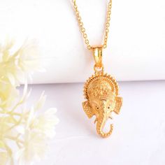 About item Item :-Ganesha pendent Ring size :- Chose from variation (Custom size accepted) Material  :- 925 Sterling silver Purity  :- 92.5 Title:- Elephant God Ganesha pendant, Ganesha Hindu God Antique Ganesha Pendent, Ganesha Pendent lucky Ganesha,Spiritual jewelry,Hindu God necklace , Christmas Gift, Meditation Jewelry, Christmas Gift, Women's gift, Mother's day gift, Gift for her, Christmas day gift, Valentine's day gift Description:- We use 925 sterling silver to making jewelry. We accept all types of custom & personalized order. Please send us a message if you are interested in a custom creation. Shipping profile:- We ship all order within 3-5 days. But custom order takes time. Customer service :- If you have any question about our products & services, feel free to contact us. We do Temple Necklace With Locket For Diwali Puja, Festival Temple Necklace With Large Pendant As Gift, Festivals Gift Temple Necklace With Large Pendant, Gift Large Pendant Temple Necklace For Festivals, Diwali Temple Necklace With Locket For Puja, Festival Gift Temple Necklace With Large Pendant, Diwali Puja Temple Necklace With Locket, Spiritual Round Pendant Necklace For Diwali, Spiritual Locket Necklace For Navratri