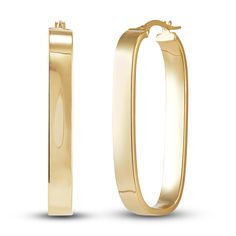 These versatile 39x15mm women's tube hoop earrings are polished to a high shine to sparkle on every ear. Fashioned in 10K yellow gold the earrings secure in place with hinged backs. Classic Rectangular Hoop Earrings For Anniversary, Engraved 14k Yellow Gold Hoop Earrings, Yellow Gold Hoop Earrings In Brass, Yellow Gold Brass Hoop Earrings, Yellow Gold Tarnish-resistant Brass Hoop Earrings, Jared The Galleria Of Jewelry, Luxury Gold-tone Brass Hoop Earrings, Large Hoop Earrings, Yellow Color