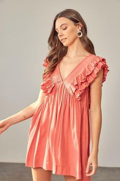 STYLE INFORMATION: Ruffles have taken a hold on our hearts in the Kat Rose Ruffle Romper Dress! Pleated ruffle sleeves decorate this flirty romper dress with a deep, V-neck and back. Babydoll bodice, hidden side pockets, and a flirty mini hem finish the look. DETAILS & CARE: Lined. Polyester. Hand Wash Cold. Imported