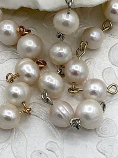 Freshwater AA+ 9mm White Near Round Freshwater Pearl Beaded Rosary Chain Length: 1 foot Pearl Grade: AA+ Pearl Luster:High Pearl Shape: Near Round Pearl Size: 9mm Pearl Color: White Easy open links Components used in listing are not included but can be purchased in my shop. These items are for Idea purposes only. www.instagram.com/blingbya @blingbya Classic Pearl Necklace With Round Beaded Chain, Classic Pearl Necklace With Beaded Chain, Pearl Charm For Jewelry Making, Pearl Charm Round Beads For Jewelry Making, Elegant Pearl Bracelet With Beaded Chain, Classic Pearl Jewelry With Beaded Chain, Elegant Pearl Necklace With Spacer Beads For Wedding, Elegant White Pearl Bracelet With Spacer Beads, Pearl White Beaded Pearl Necklace