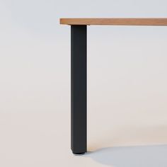 a wooden table with black metal legs on a white background