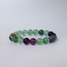 Illuminate your path with the Colorful Fluorite Beaded Bracelet by Asana Crystals. Each 10mm round bead of natural Colorful Fluorite radiates harmony, balance, creativity, intuition, and transformation. Let this vibrant masterpiece be your guide to self-discovery, joy, and spiritual growth.











 

 	Crystal: Natural Colorful Fluorite
 	Type: Beaded Stretch Bracelet
 	Bead Size: 10 MM
 	Bracelet Size: 7 Inches
 	Wrist Size Range: 6 to 7
 	Bead Shape: Round
 	Closure: None
 	Other Materials: N/A Round Hypoallergenic Crystal Bracelet For Healing, Hypoallergenic Round Crystal Bracelet For Healing, Fluorite Gemstone Beads Bracelets For Healing, Fluorite Gemstone Beads Bracelet For Healing, Spiritual Fluorite Bracelets For Healing, Spiritual Fluorite Bracelet For Healing, Spiritual Fluorite Crystal Bracelet For Healing, Spiritual Healing Fluorite Bracelet, Healing Gemstone Beaded Bracelets