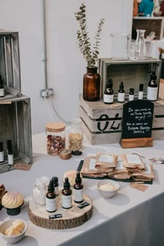 the table is set up with bottles and other items