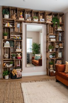 a living room filled with lots of wooden shelves and plants on top of each shelf