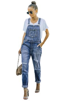 Sky Blue Distressed Bib Denim Overalls Medium Wash Denim Jumpsuit, Denim Jumpsuit With Frayed Hem, Casual Dark Wash Distressed Denim Jumpsuit, Distressed Denim Jumpsuit In Dark Wash, Ripped Denim Blue Jumpsuit, Trendy Distressed Medium Wash Denim Jumpsuit, Distressed Denim Blue Jumpsuit, Distressed Denim Jumpsuit For Fall, Distressed Denim Jumpsuit In Denim Blue