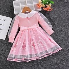 This high-quality long-sleeved Toddler Girls Elsa Dress is crafted from soft, breathable cotton and mesh, with a stylish ball gown silhouette and adorable cartoon design. Perfect for putting on a royal display at any time, this dress is designed for girls aged 2-8 years. Comfortably lightweight, the dress also features a full-length sleeve and a flattering O-neck. Let her experience the enchantment of Arendelle with this stunning Elsa dress--perfect for dress-up games with her pals! Transform yo Long Sleeve Tutu Dress For Dress-up In Spring, Long Sleeve Tutu Dress For Spring Dress-up, Cute Long Sleeve Dresses For Spring, Cute Long Sleeve Spring Dress, Cute Long Sleeve Dress For Dress-up, Cute Long Sleeve Dress-up Dresses, Spring Party Tutu Dress With Long Sleeves, Spring Party Long Sleeve Tutu Dress, Sweet Long Sleeve Spring Dress