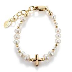 This keepsake bracelet is made with genuine high-end Austrian simulated pearls and 14K Gold-plated beads accented with a dainty cross embellished in the center! This is a high quality bracelet in sterling silver with 14K gold plating with high-end crystals. This makes a very special baptism, christening, or dedication gift or First Communion Keepsake. Each bracelet has an adjustable extension chain, as the child grows just move to the next link for a perfect fit. This jewelry is available in thr Communion Gifts Girl, First Communion Gifts, Communion Gifts, Cross Bracelet, Gold Cross, Cross Charms, First Communion, Initial Charm, Beautiful Gift Boxes