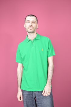 Vintage green classic Ralph Lauren polo shirt {P47} PRODUCT INFO: Material - 100% COTTON / Size tag on item - L / PIT TO PIT - 55 CM / 21.5 INCH / FULL LENGTH - 77 CM / 30 INCH / Our model is 179 cm and normally wears a size M INFO: Due to item's vintage condition, the original tag might not show the true size. If you have any questions about this product or shipping just drop us a message and we will get back to you as soon as possible. CONDITION: Please note that Hanger Vintage sell true vinta Classic Green Shirt With Polo Collar, Classic Green Short Sleeve Top, Casual Green Collared Polo Shirt, Classic Fitted Green T-shirt, Fitted Classic Green T-shirt, Green Collared Casual Polo Shirt, Fitted Green Collared T-shirt, Fitted Green Polo Collar Top, Fitted Green Short Sleeve Polo Shirt