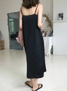 Material: PolyesterStyle: Sexy & ClubSilhouette: LoosePattern Type: SolidSleeve Length(cm): SleevelessDecoration: NoneDresses Length: Mid-CalfSleeve Style: Spaghetti StrapWaistline: NaturalNeckline: V-NeckSeason: Summer Black Sleeveless Midi Dress For Vacation, Black Sleeveless Slip Dress For Vacation, Black Sleeveless Casual Slip Dress, Casual Black Sleeveless Slip Dress, Black Sleeveless Slip Dress For Night Out, Black Midi Dress With Spaghetti Straps For Summer, Black Camisole Dress For Spring, Black Camisole Dress For Beach, Black Camisole Dress For The Beach