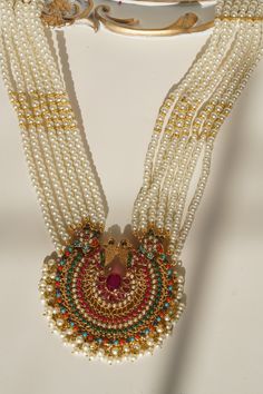 Step into the realm of timelessness with the "Inza - Mala Necklace & Tikka Set." This set embodies distinct style, intricacy, and craftsmanship reminiscent of a bygone era, adding a touch of enchantment to your ensemble.Adorn yourself with charisma as you wear this talismanic set adorned with ethereal stones and the grace of pearl moti, all while radiating the traditional and aesthetic identity. This set includes a long mala necklace and a pair of stunning earrings, each designed to capture the Ear Chain, Accessories Ear, Jewelry Styles, Chandbali Earrings, Pakistani Jewelry, Choker Necklace Set, Bygone Era, Jhumka Earrings, Mala Necklace