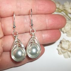 Wire Wrap Earrings Grey Pearl Silver Beaded Handmade Dangle Drop Jewelry C355 This Costume Jewelry Beaded Earring Set Are Brand New Nwt And Handmade By Me - Wvluckygirl. Handcrafted With Gray Acrylic Faux Pearl Beads. These Were Wire Wrapped With Silver Toned Tarnish Resistant Wire To Form A Basket Weave Around The Beads. The Pair Dangle And Drop From 925 Sterling Silver French Fishhook Ear Wires For Her Pierced Ears. From Top To Bottom They Measure 1 3/4 Inches Tall And Just Over 1/2 Inch Wide. Silver Hypoallergenic Pearl Earrings For Party, Silver Metal Jewelry With Pearl Drop, Hypoallergenic Silver Pearl Earrings For Party, Silver Wire-wrapped Earrings For Party, Silver Metal Teardrop Earrings Wire Wrapped, Silver Wire-wrapped Teardrop Earrings, Silver Wire Wrapped Earrings For Party, Silver Metal Wire Wrapped Teardrop Earrings, Silver Wire Wrapped Metal Teardrop Earrings