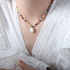 Style: Female Material: Titanium Steel, Faceted Abacus Beads Zircon, Mother of Pearl Pearl Type: Cultured Pearl Color: White Necklace Length: 42+5cm Pendant Size: 1.5cm Adjustable Clavicle Chain With Round Beads, Adjustable Clavicle Chain Necklace With Round Beads, Multicolor Clavicle Chain Necklace With Round Beads, White Charm Necklaces With Colorful Round Beads, White Bohemian Beaded Necklaces With Clavicle Chain, Colorful Beads Pearl Necklace Gift, Colorful Beaded Round Pearl Necklace Gift, Colorful Beaded Round Pearl Necklace For Gift, Colorful Beaded Pearl Necklace Gift