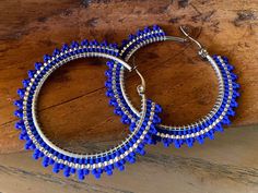 "Royal blue mattehoops These earrings are done in brick stitch with a stunning Royal blue matte & silver glass delica bead  They measure a little over 2\" inches, have leverback so no losing your backings and are incredibly lightweight & easy to wear. ALL ITEMS ARE MADE TO ORDER AND DONE IN ORDER OF PURCHASE  I am First Nation, Plains Cree so you are buying authentic items made by myself in a smoke and pet free home." Native Beaded Earrings, Beaded Patterns, Boho Hoop Earrings, Earrings Summer, Summer Earrings, Summer Earring, Silver Glass, Beaded Hoop Earrings, Beaded Hoops