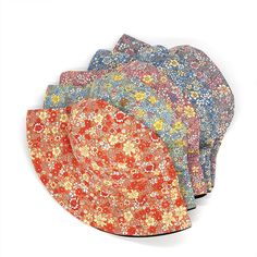 This sun-ready bucket hat comes in a soft fabrication and structured-style with a floral pattern, flat-top, and flared brim, making it a summer favorite silhouette. Specs: Floral pattern Two-sided Material: Cotton, Polyester Size: 56-58cm/22.1"-22.8" Casual Brimmed Sun Hat With Floral Print, Spring Multicolor Bucket Hat With Uv Protection, Multicolor Uv Protection Bucket Hat For Spring, Curved Brim Sun Hat With Floral Print For Beach, Multicolor Sun Hat For Summer Garden Party, Summer Hat With Floral Print For Vacation, Multicolor Wide Brim Sun Hat For Garden Party, Multicolor Summer Hat For Garden Party, Adjustable Floral Print Sun Hat For The Beach