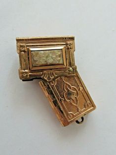 Victorian Gold Mourning Book Locket Fob Charm Daguerrotype | eBay Victorian Tear Catcher, Victorian Items, Hair Locket, Cowgirl Bachelorette Parties, Victorian Hair, Victorian Accessories, Sentimental Jewellery, Victorian Locket, Cowgirl Bachelorette