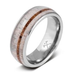 a wedding ring with a wooden inlay and cross on the inside, made from stainless steel