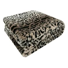 a blanket that is made out of animal print