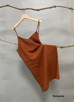 "Nothing welcomes the hot weather more than linen. This simple linen slip dress is a must have and can be more playful if layered. -100% linen construction -V neck -Slightly A-line shaped -Adjustable spaghetti straps -Above the knee -Slip on overhead Please provide your shoulder width, full bust measurement ( measured around the fullest part) and your height in the note to seller box. Don't see your size? Please message us for custom made order. -Fitting: Relaxed Taking Care: -Machine wash in co Summer Cotton Sundress Suspender Dress, Summer Cotton Suspender Dress Mini Length, Summer Cotton Mini Suspender Dress, Summer Cotton Suspender Mini Dress, Summer Cami Mini Dress, Summer Sundress Mini Dress With Camisole Shape, Summer Sundress With Camisole Shape, Mini Suspender Summer Dress, Summer Camisole Dress For Day Out