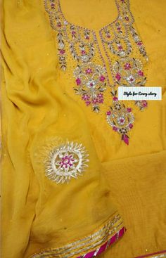 Item Overview ATHARVA Hand Embroidered Salwar Kameez w/Beautiful Neck Embroidery in Yellow/Banarsi Silk Dupatta Pink/Bridal Trousseau/Custom Stitch.CH1429 Fabric: * Shirt Chanderi/Yellow/ 2.5 Mts, with Beautiful Neck Embroidery * Dupatta:Chiffon Chinnon Dupatta: Gota Patti work (Motifs may wary) * Bottom Yellow Santoon Silk Silk Salwar.5 Mts. Excusive Hand Embroidered Party Wear Punjabi Suit. Customization: * Fabrics: Designs Can be made in different Fabrics. * Stitching Available Care: * Dry Cl Elegant Yellow Kurta With Mirror Work, Elegant Yellow Churidar With Gota Work, Yellow Organza Sets With Mirror Work, Designer Nida Traditional Wear With Mirror Work, Designer Traditional Wear With Mirror Work In Nida, Elegant Yellow Salwar Kameez With Mirror Work, Unstitched Georgette Sharara With Gota Work, Eid Kundan Embroidered Fabric, Bollywood Style Nida Kurta With Mirror Work